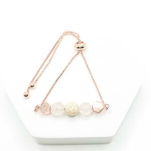 Rose Gold Adjustable Bracelet with Frosted Beads and Lava Stone Center